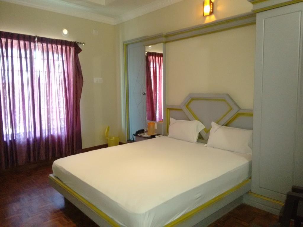Hotel Chithra Канниякумари Номер фото