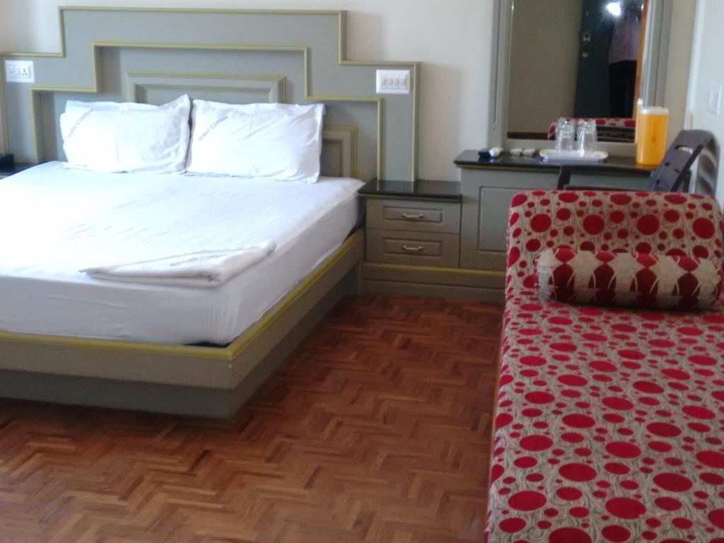 Hotel Chithra Канниякумари Номер фото